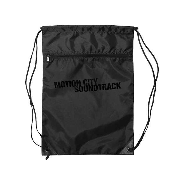 black drawstring bag with MOTION CITY SOUNDTRACK in bold black lettering, zipper pocket on the front.